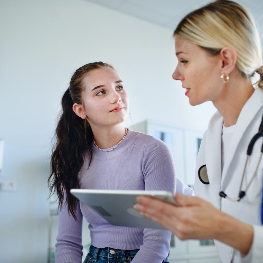 Psychiatric provider reviewing medication with a patient